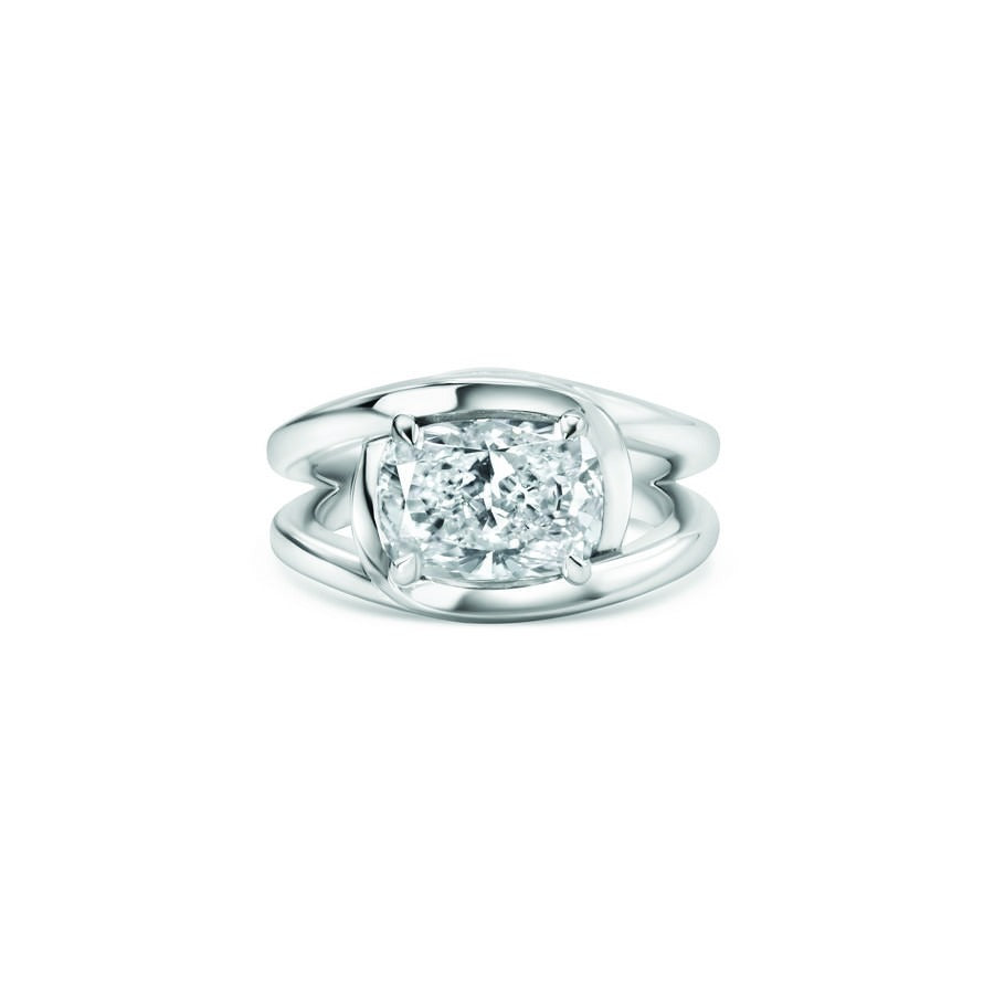 Marquise Ring with Emerald and Round Side Stones