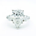 Oval Ring with Fancy Yellow Side Stones