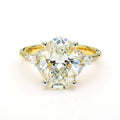 Oval Ring with Round Diamond Accents