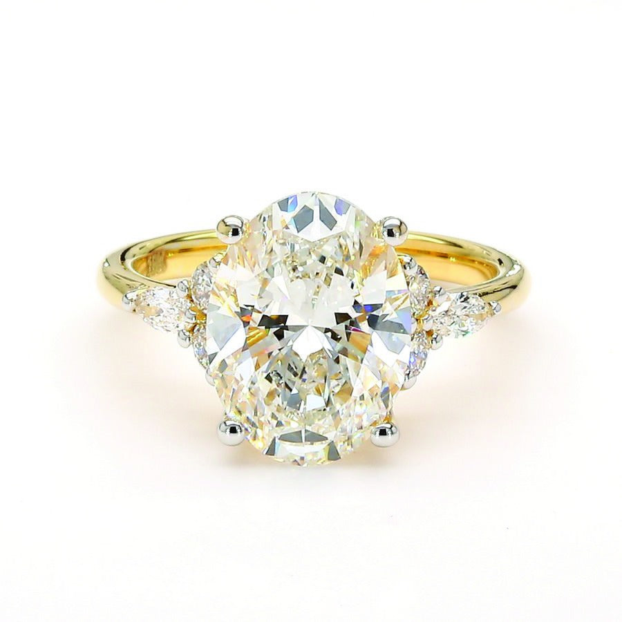 Oval Ring with Round Diamond Accents