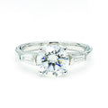 Oval Ring with Round Side Stones